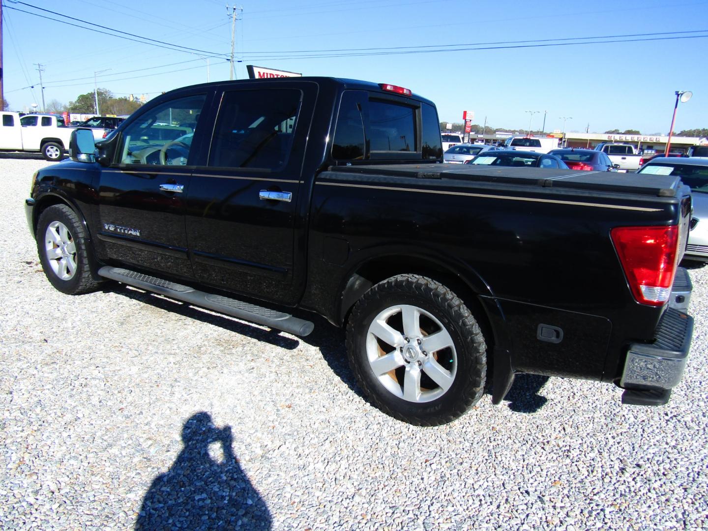 2011 Black /Tan Nissan Titan (1N6BA0ED1BN) , Automatic transmission, located at 15016 S Hwy 231, Midland City, AL, 36350, (334) 983-3001, 31.306210, -85.495277 - Photo#5